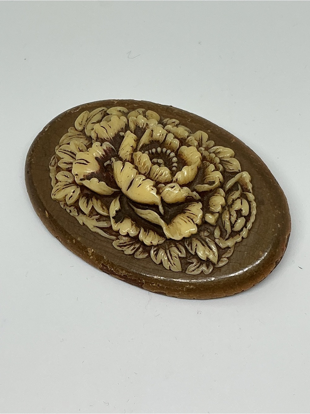 Vintage Carved Celluloid Floral Oval Brooch